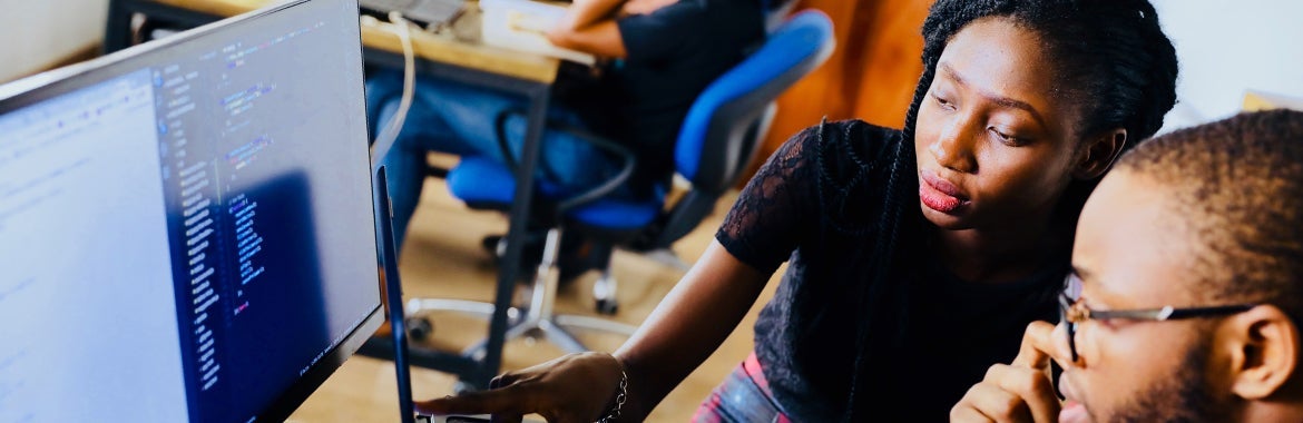 Two students at a computer