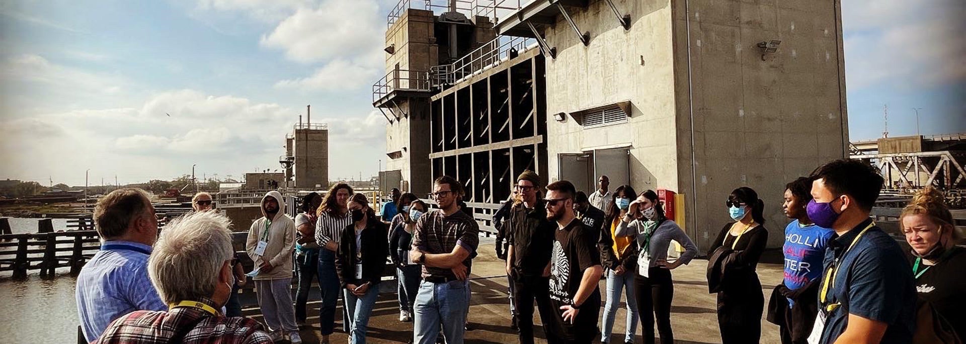 photo of students outside of factory facilities