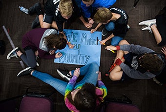 photo of students making social justice poster