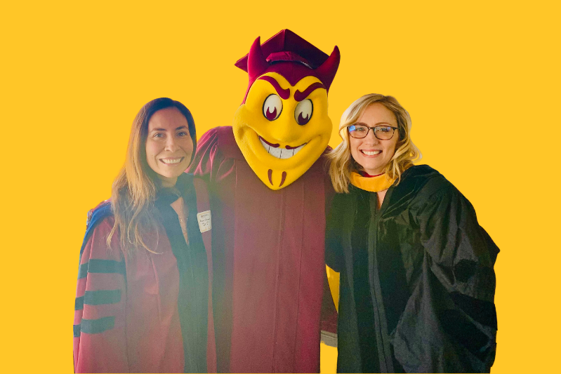Teaching Professors Laura Clemons and Natalie Fabert with Sparky