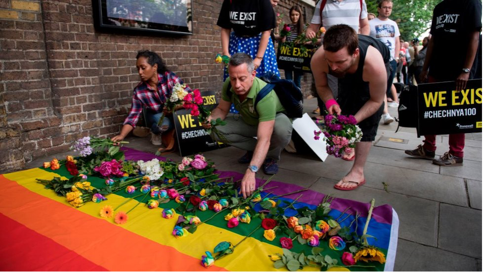 Protesters puts flowers to the memories of gays killed in Chechnya, Russiaâs Embassy in London 2017