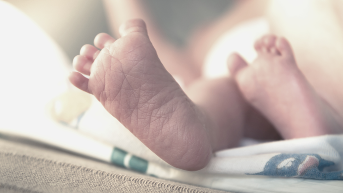 Newborn infant feet