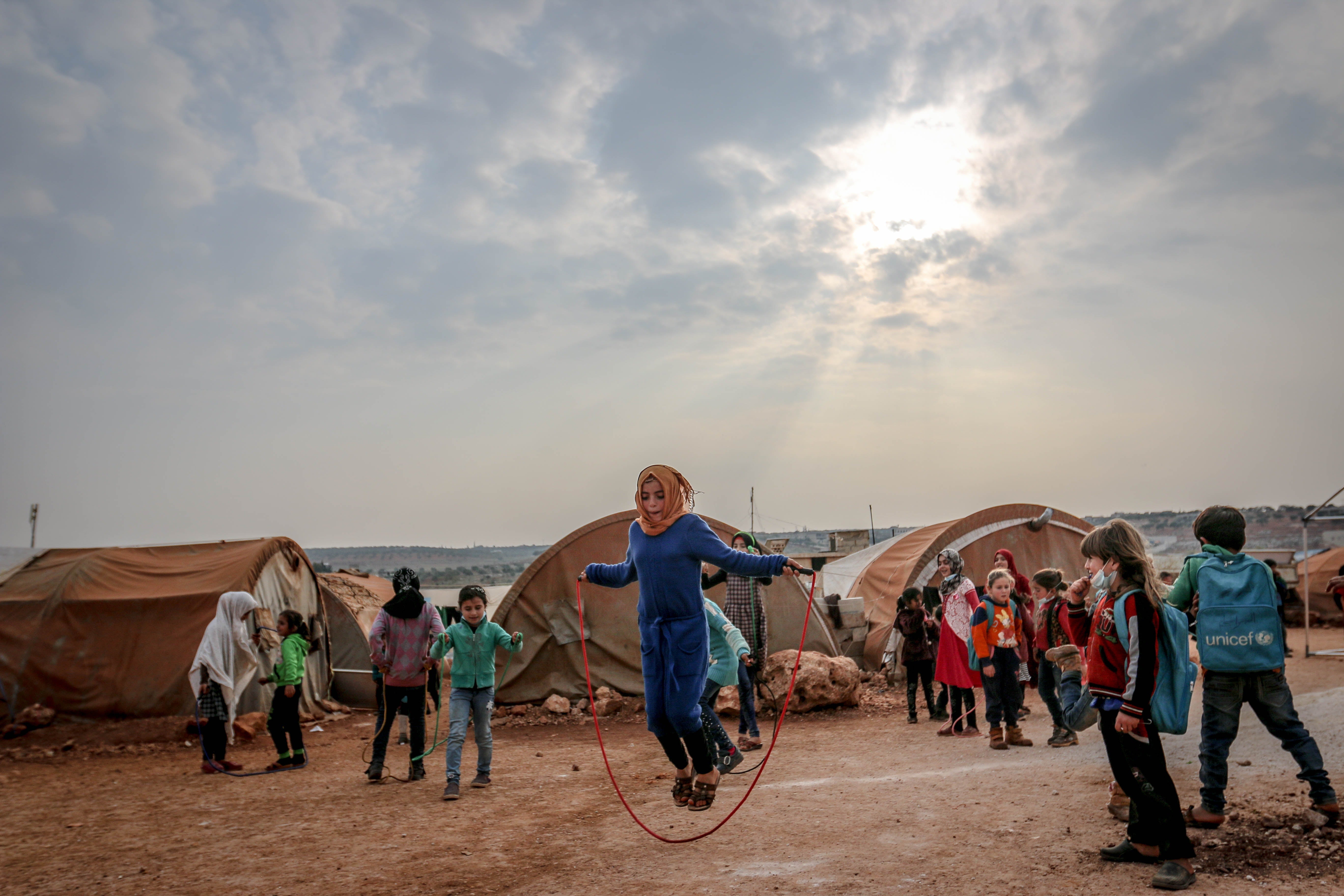 Children jumping rope in Idleb, Idleb Governorate, Syria