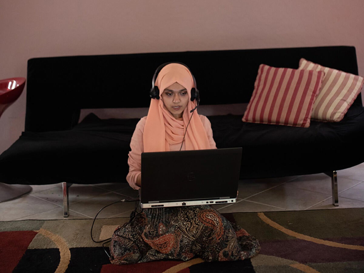 photo of student at home with computer