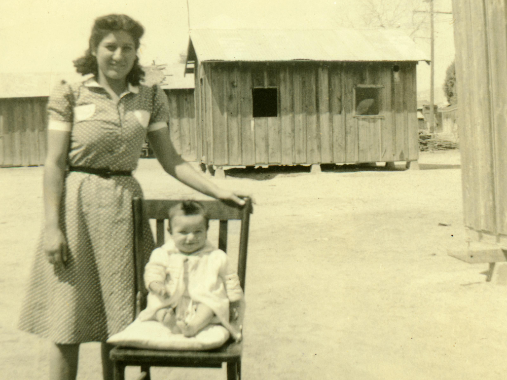 A woman and a child together in black and white